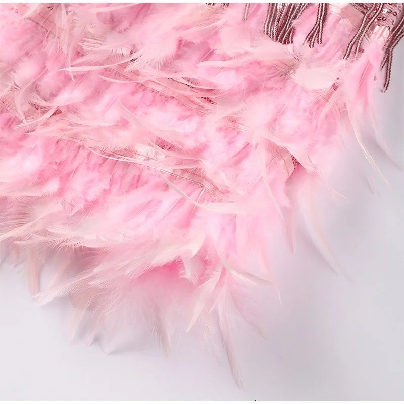 Abito corto da donna con frange e paillettes