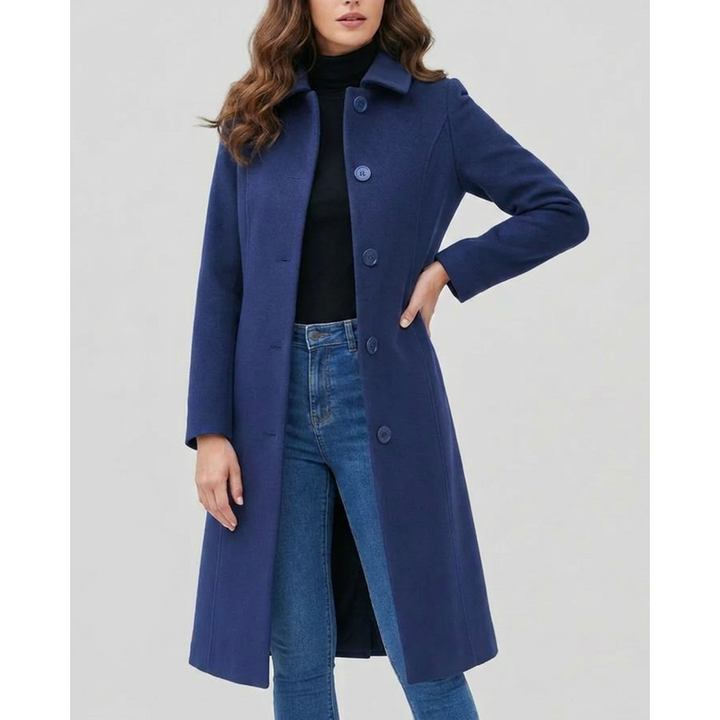 Donna con cappotto lungo blu scuro – vista laterale