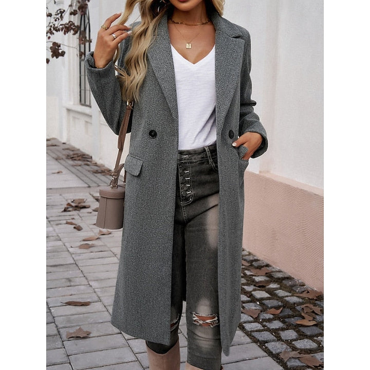 Cappotto lungo sartoriale da donna con revers grigio scuro – vista di tre quarti
