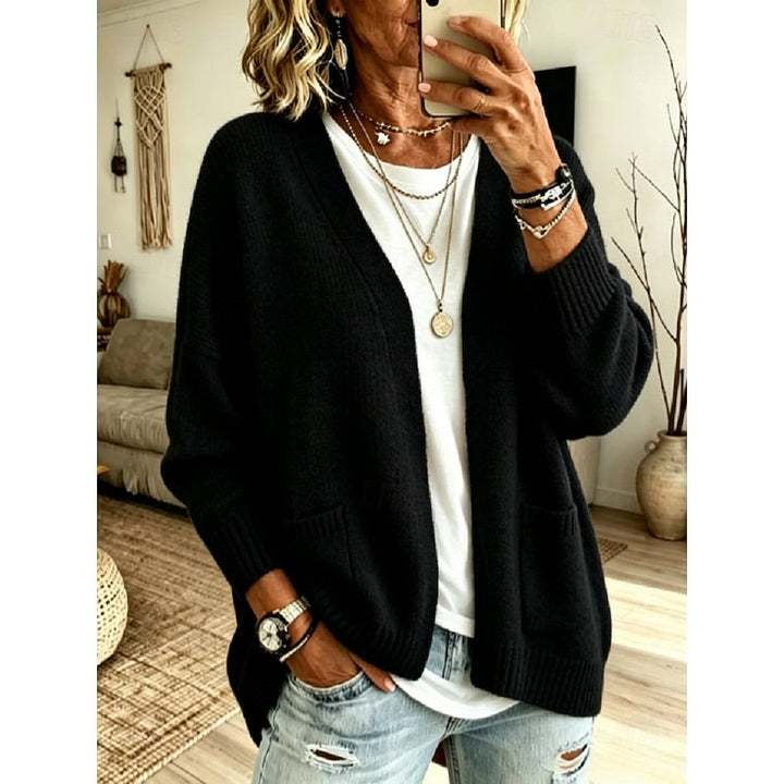 Cardigan aperto da donna con tasche nero – vista frontale