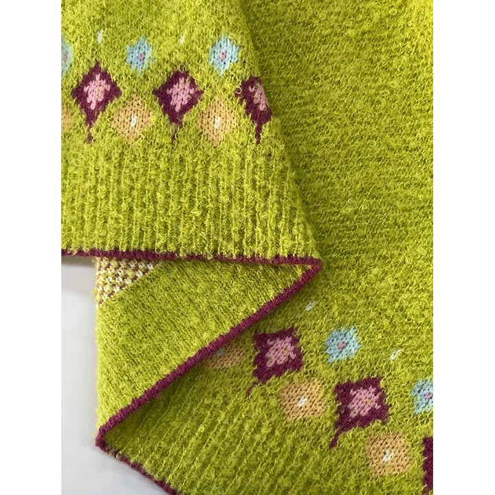 Cardigan da donna con motivo nordico giallo verde – dettaglio del motivo nordico