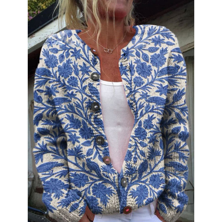Cardigan da donna in maglia blu con motivo floreale bianco – vista frontale