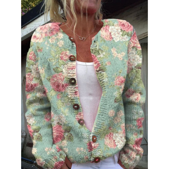 Cardigan da donna verde menta con fiori rosa in maglia