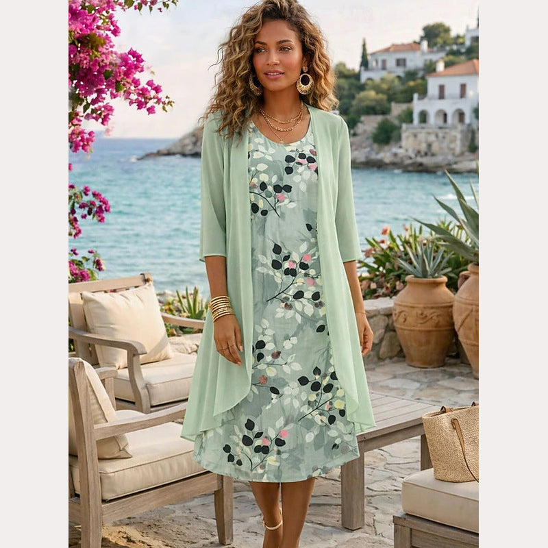 Damen-Ensemble mit geblümtem Kleid und passendem leichtem Cardigan für besondere Anlässe