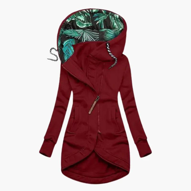 Giacca lunga da donna rosso con cappuccio a fantasia e zip asimmetrica