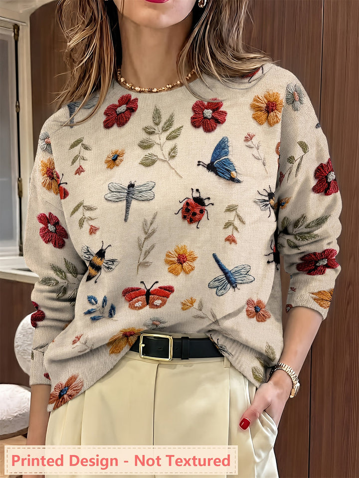 Maglione donna con stampa di fiori e farfalle – vista frontale