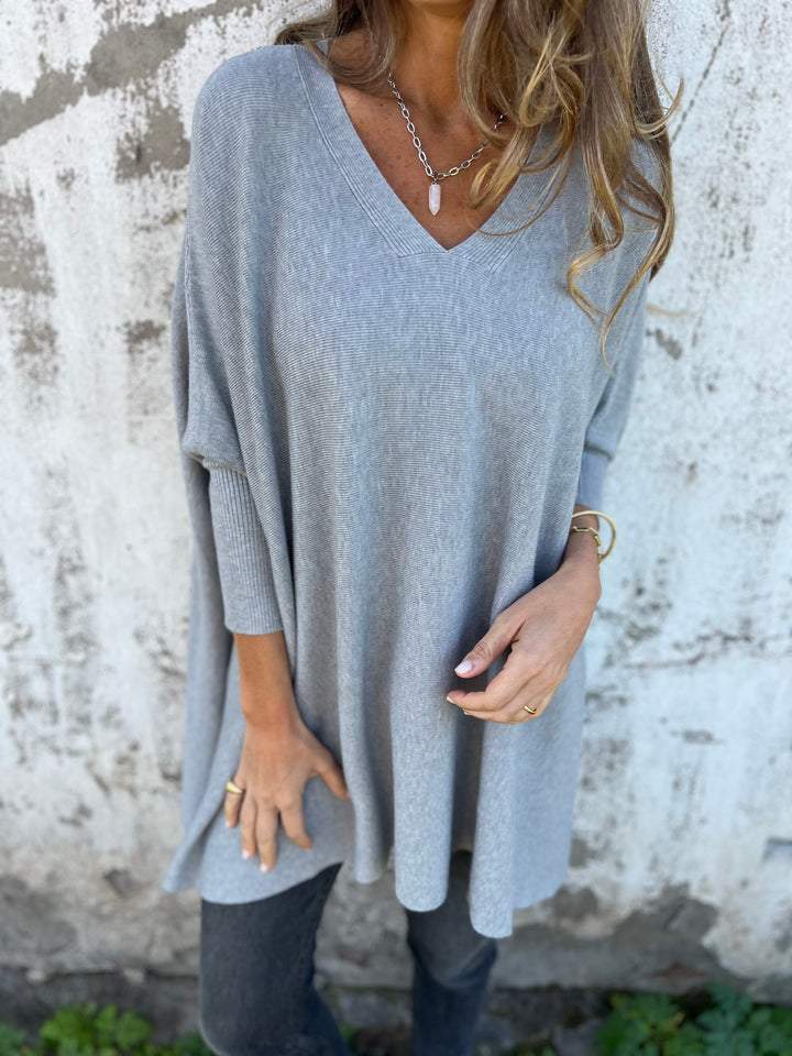 Maglione donna lungo con scollo a V grigio