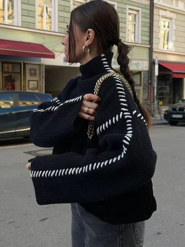 Maglione donna nero con cuciture a contrasto – vista laterale