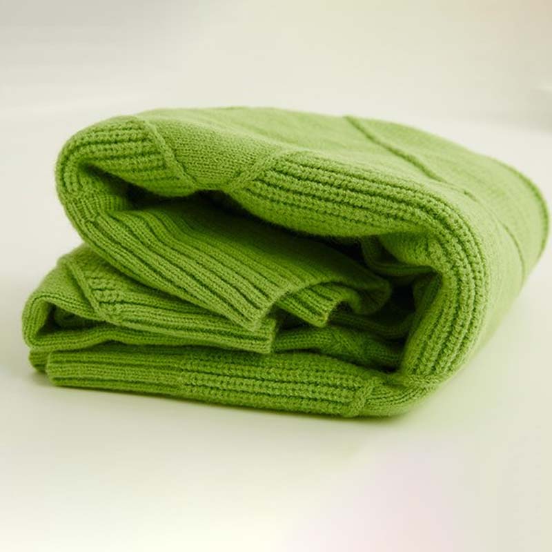 Maglione donna verde lime piegato