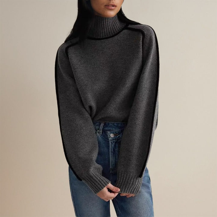 Maglione Donna a Collo Alto con Maniche Ampie e Bordi a Contrasto in grigio scuro, indossato, vista frontale