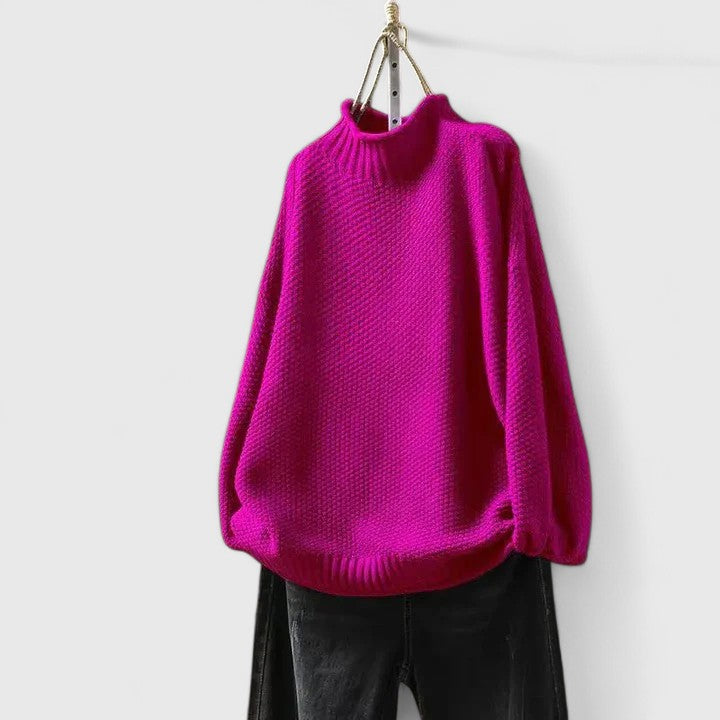 Maglione donna a collo alto dalla linea ampia fucsia