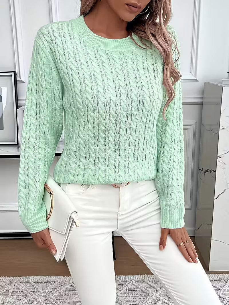 Dettaglio della maglia a trecce verde menta