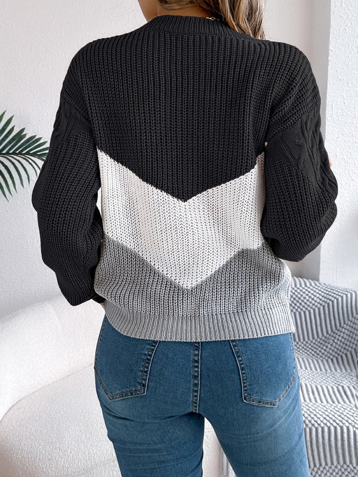 Maglione donna nero con chevron bianco – vista laterale