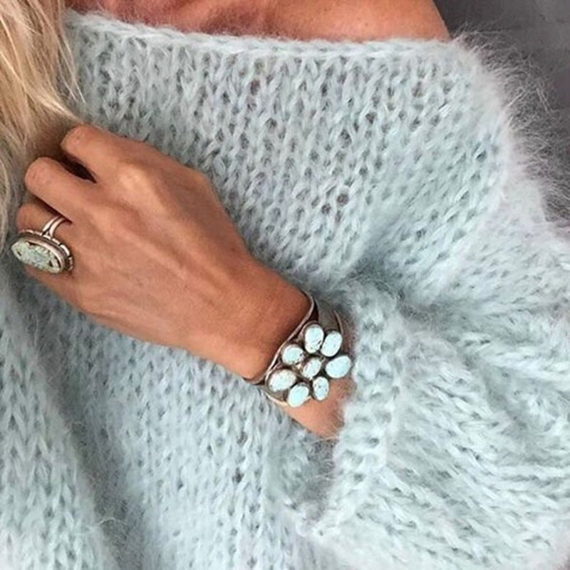 Maglione donna con scollo a barca in maglia morbida azzurro