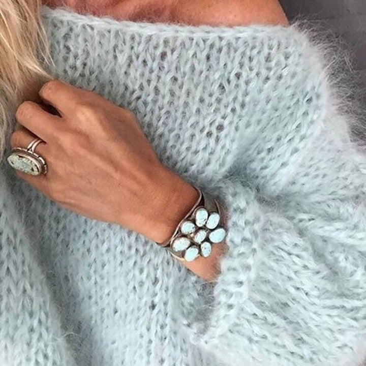 Maglione donna con scollo a barca in maglia morbida azzurro