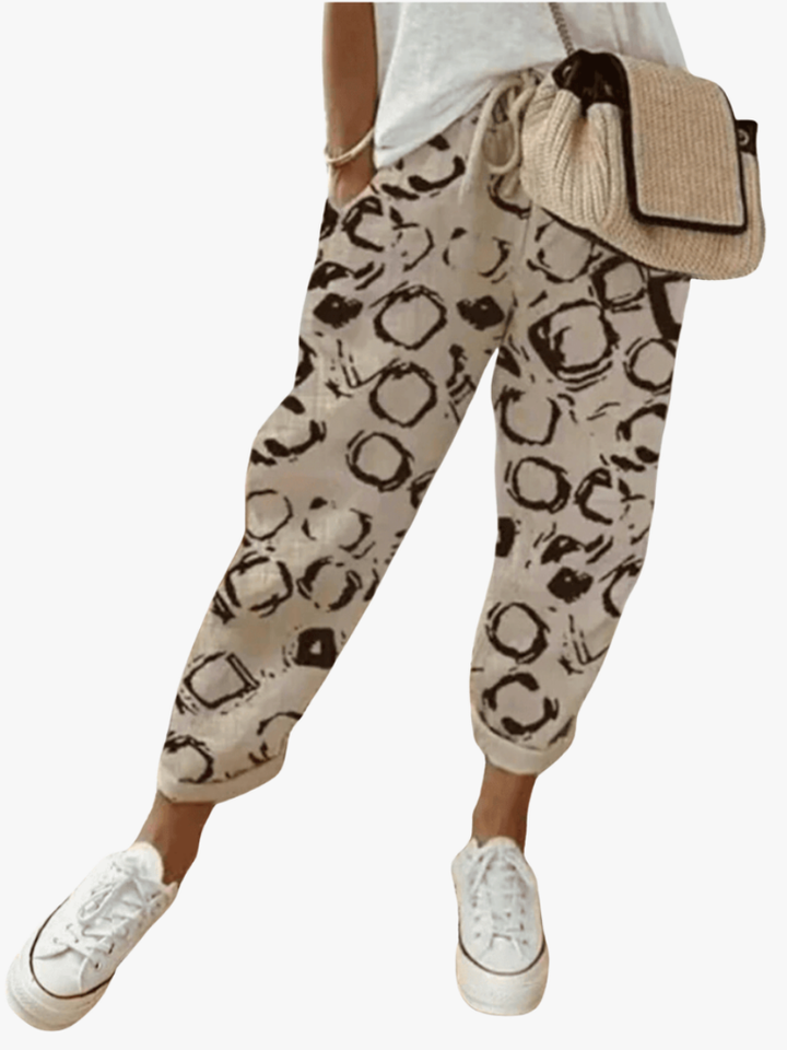 Pantaloni donna beige e nero con fantasia – vista frontale