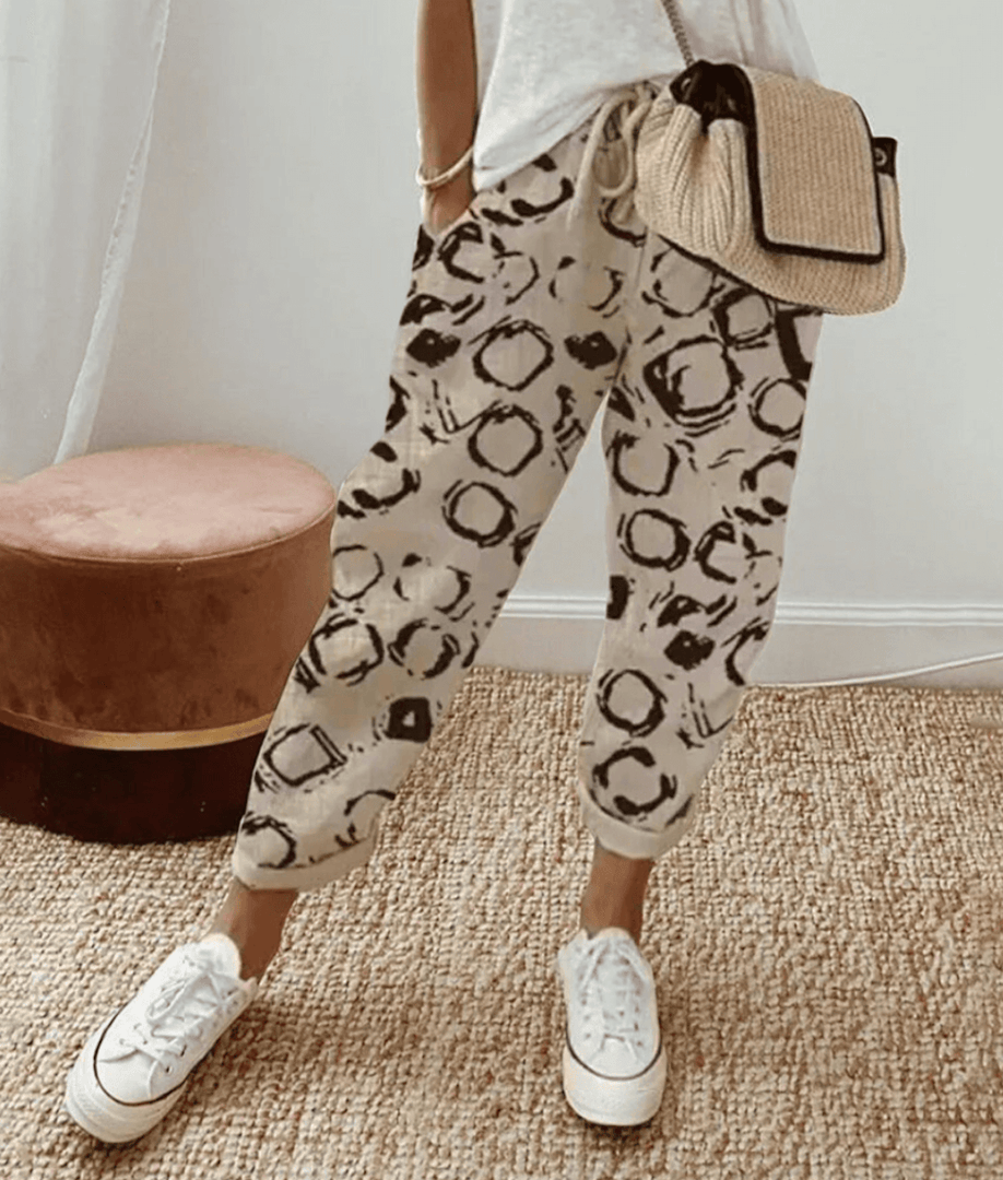 Pantaloni donna con polsini elastici beige e nero