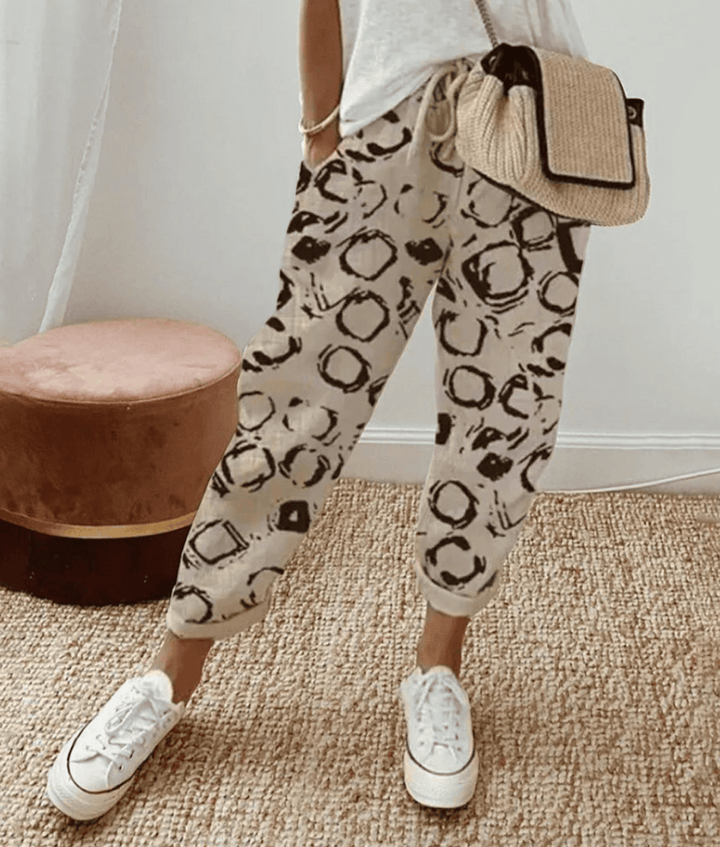 Pantaloni donna con polsini elastici beige e nero
