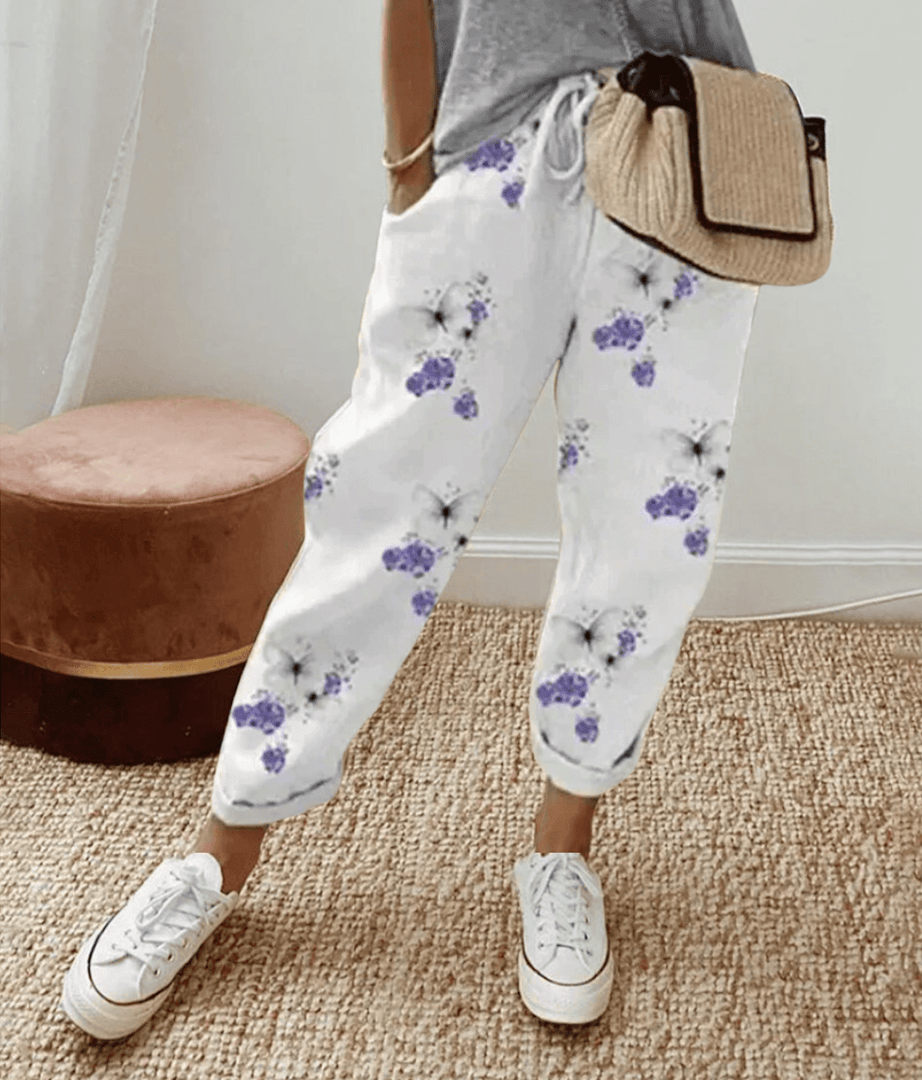 Pantaloni donna con polsini elastici fantasia floreale
