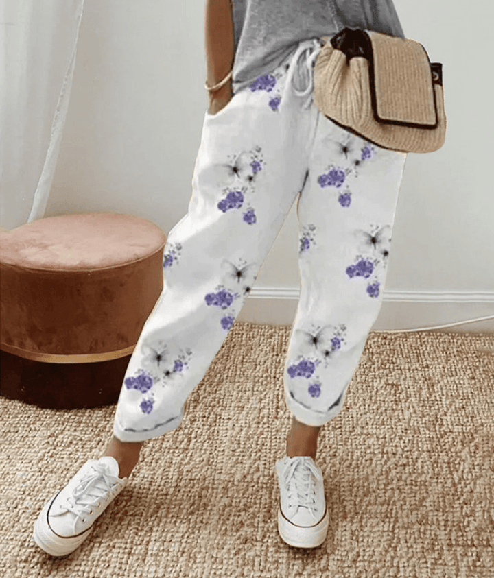 Pantaloni donna con polsini elastici fantasia floreale