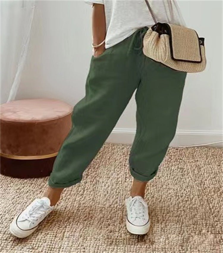 Pantaloni donna con polsini elastici verde scuro