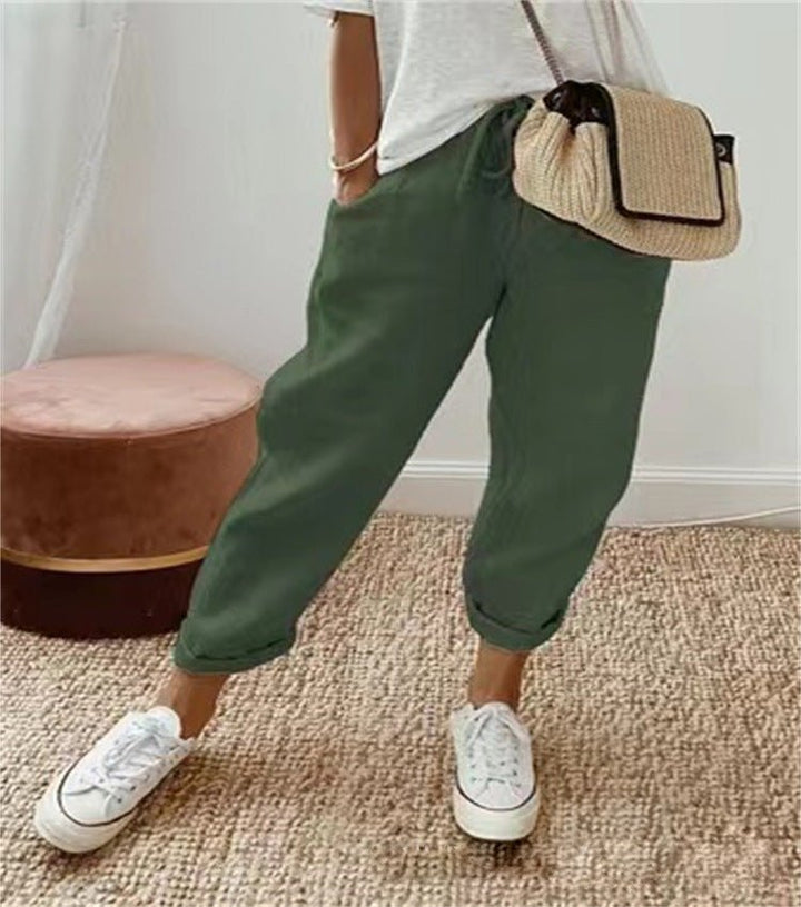 Pantaloni donna con polsini elastici verde scuro