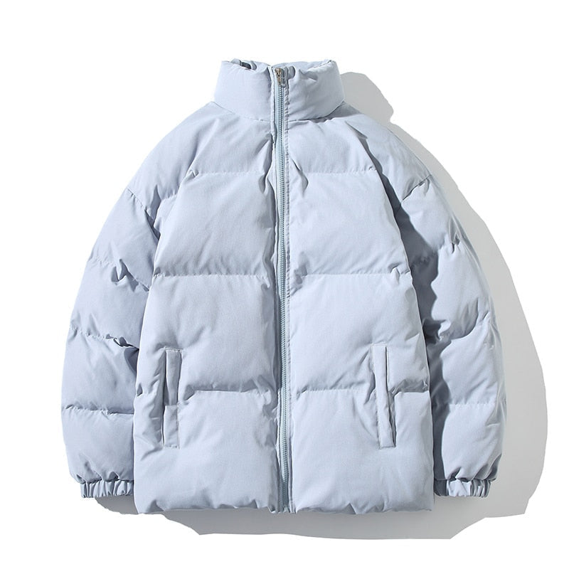Piumino donna azzurro con collo alto e zip
