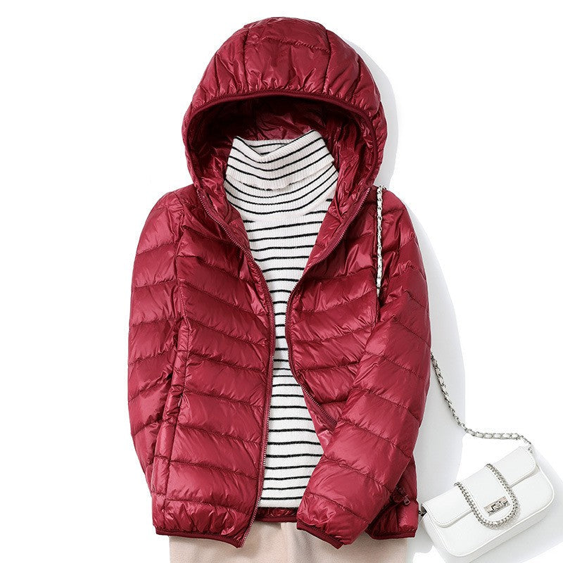 Piumino da donna bordeaux con cappuccio appeso
