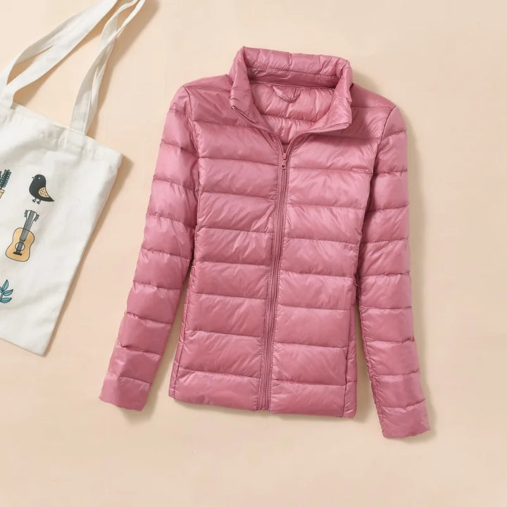 Piumino da donna rosa con collo alto – vista frontale