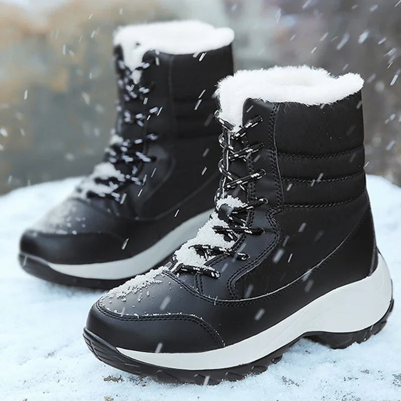 Stivali da neve donna neri indossati sulla neve