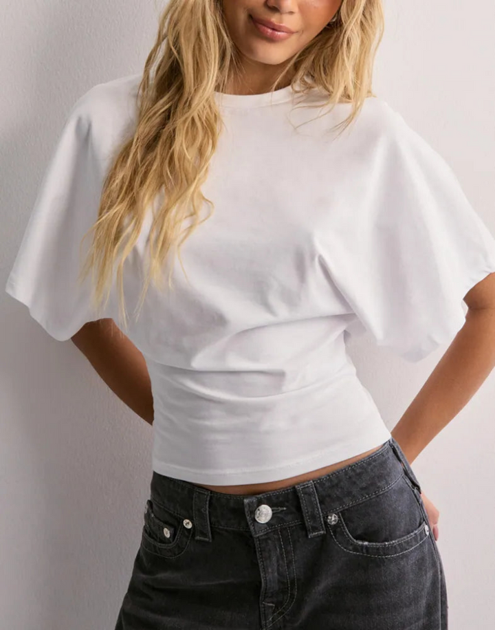 Top da donna con vita aderente e maniche ampie