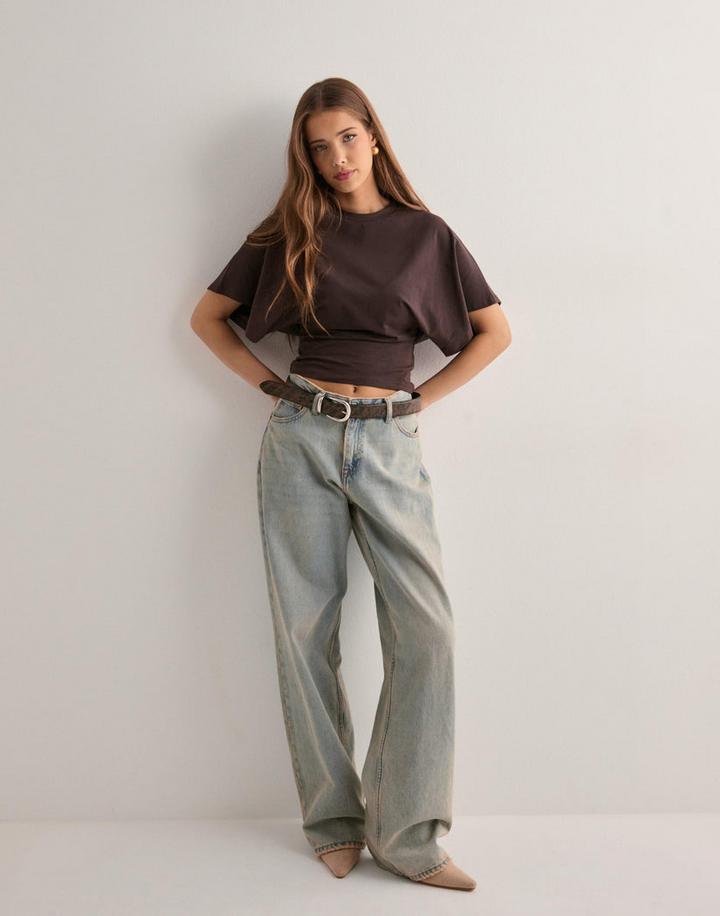 Top da donna con vita aderente e maniche ampie